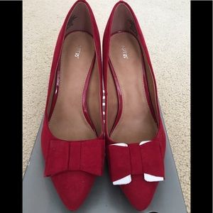 Suede red pumps